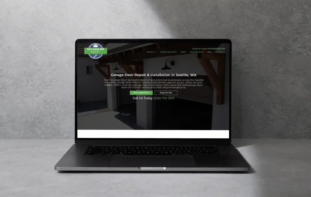 Laptop displaying Lane Garage Door Services website on screen